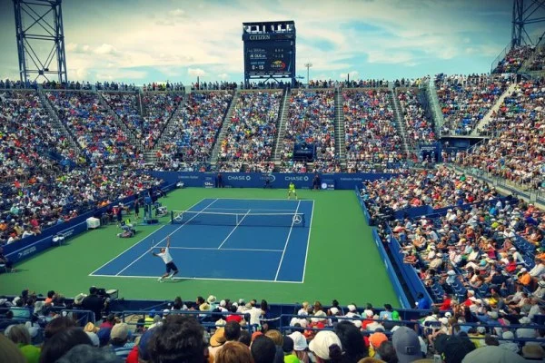 tennis stadium crowd night